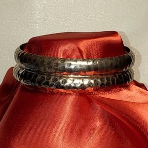 2 silver toned hammered looking bangle bracelet